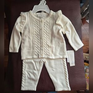 New White Knitted Baby Outfit.